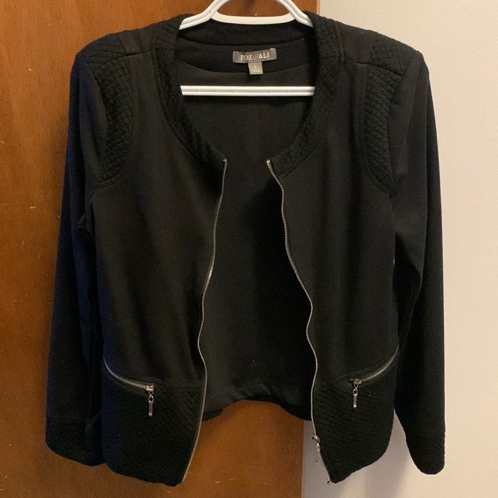 Never worn jacket with shoulder pads!